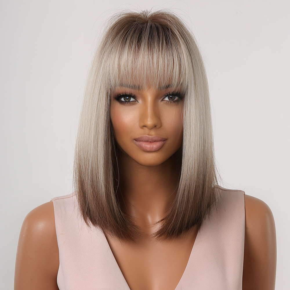 A synthetic wig in silver brown with short straight hair, styled and ready to go