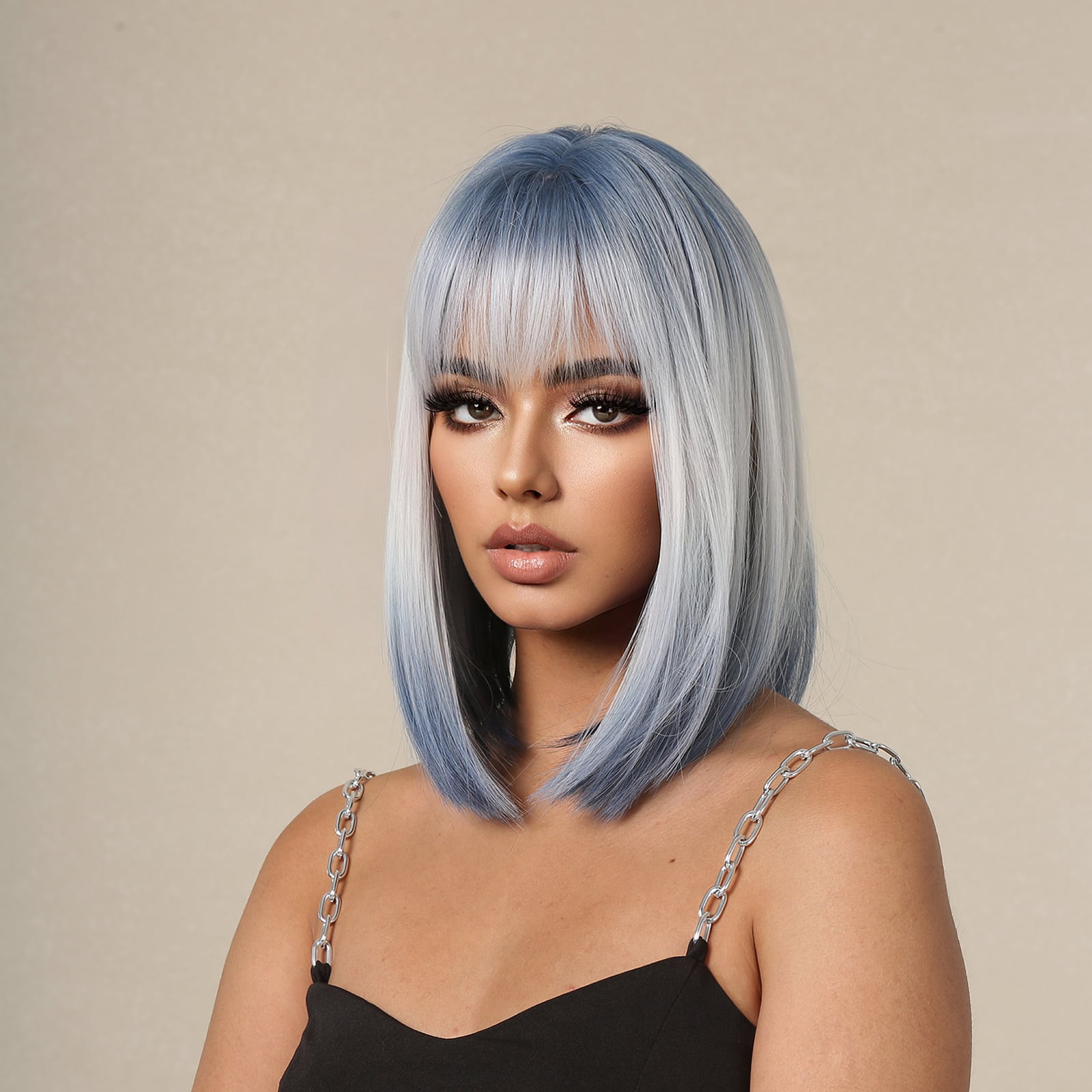A synthetic wig in silver brown with short straight hair, styled and ready to go