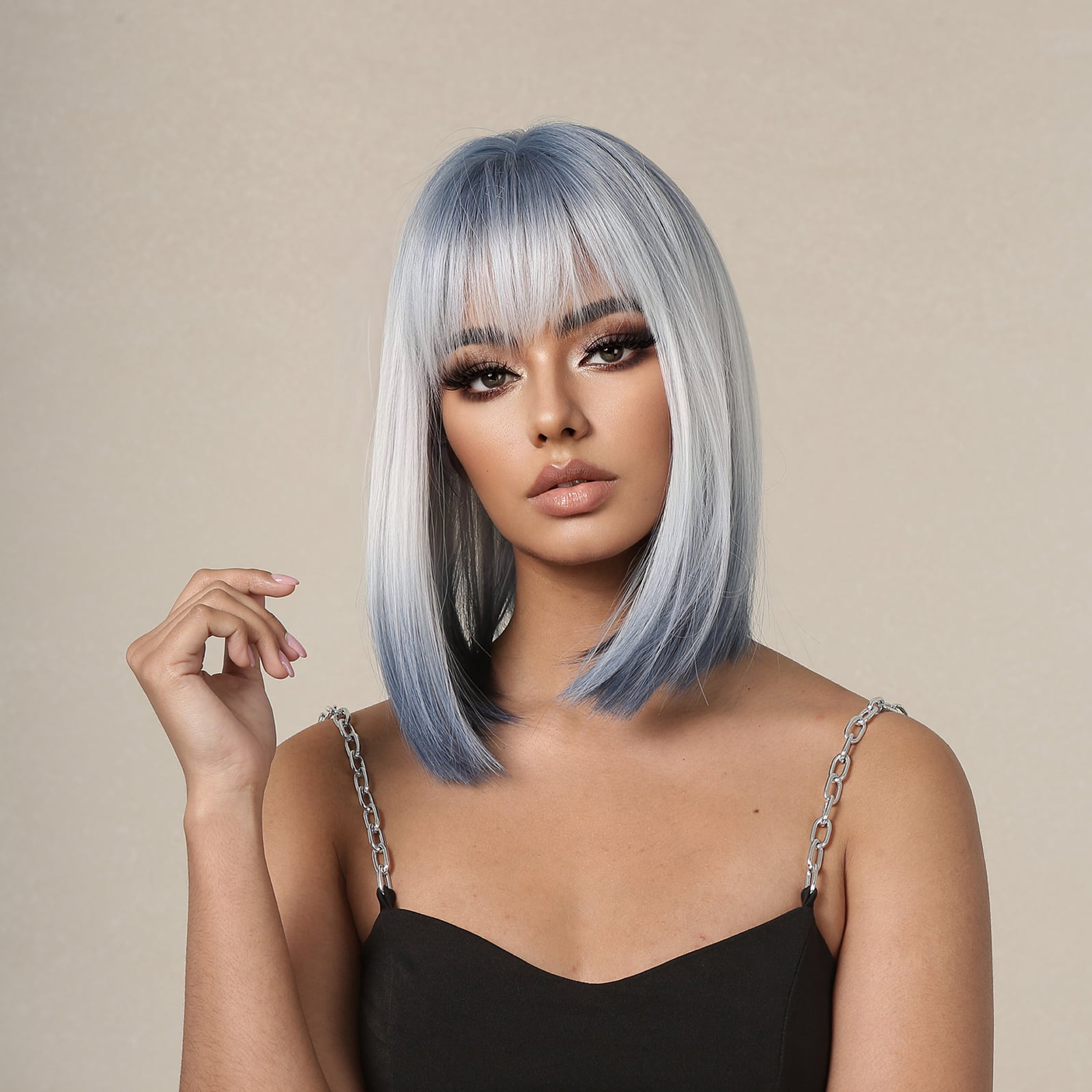 Image of a synthetic wig in silver brown with short straight hair, perfect for quick styling and ready to go