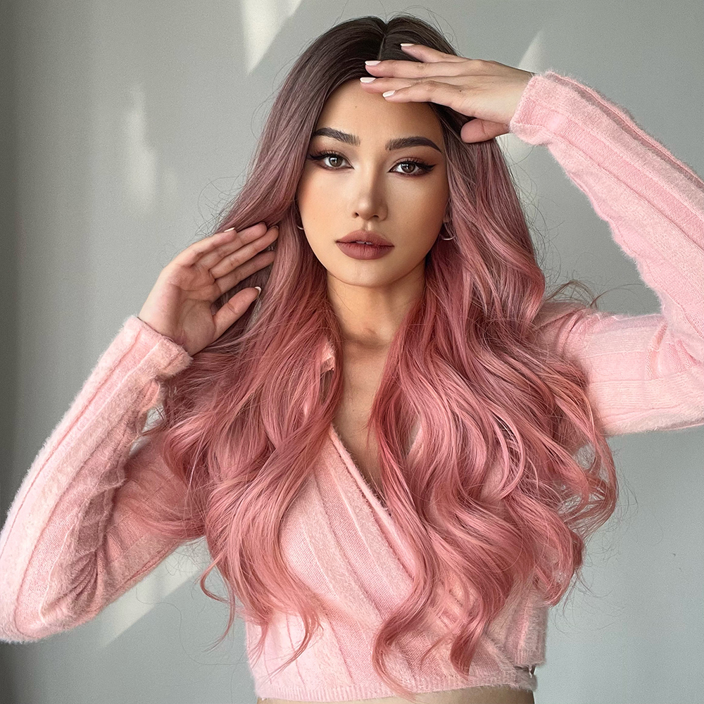A ready-to-go synthetic wig in pink with long curly hair, ideal for quick styling