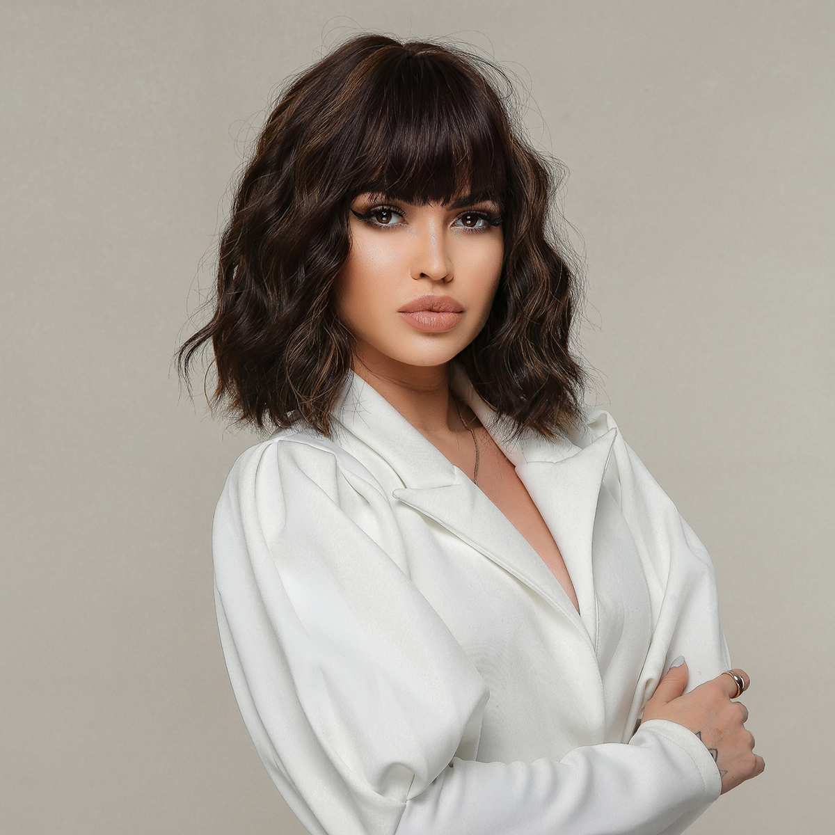 A trendy dark brown wig with short curly hair, made from synthetic material for an effortless and stylish appearance. Free shipping