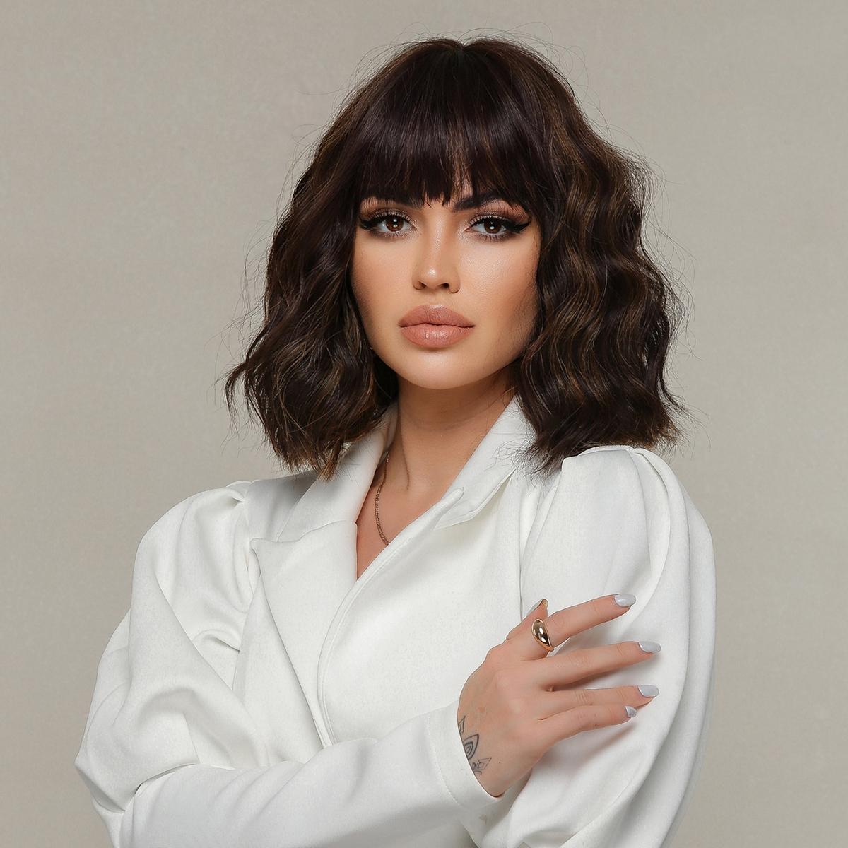 A fashionable dark brown wig with short curly synthetic hair, designed for easy styling and a ready-to-wear look. Free shipping