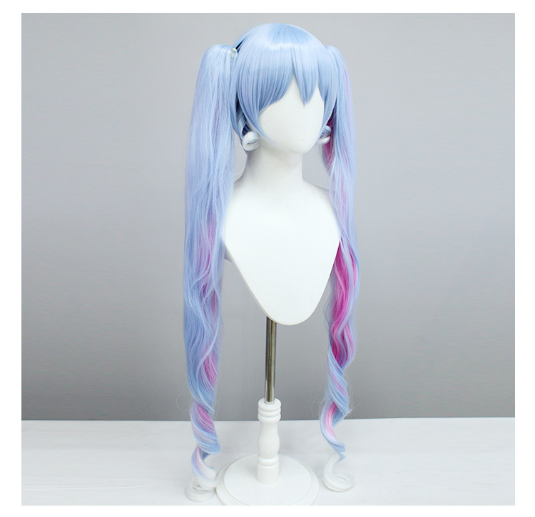 Embark on a whimsical journey with this long blue and white wig, tailored for female anime enthusiasts desiring a magical and enchanting appearance