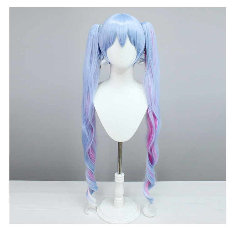 Channel the allure of an Ice Queen with this blue and white long wig, crafted for female anime cosplayers seeking a stunning and ethereal look