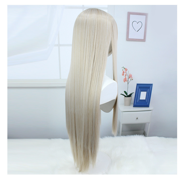 mmerse yourself in the world of cosplay with our premium blonde long wig designed for adults. The added cap ensures a secure fit and maximum comfort