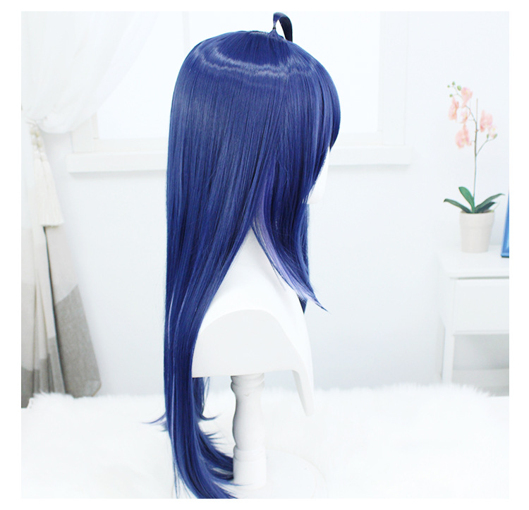 Elevate your cosplay game with this enchanting purple-blue wig, designed to captivate. The included cap ensures a snug and secure fit, making it a must-have accessory for anime enthusiasts seeking a touch of allure
