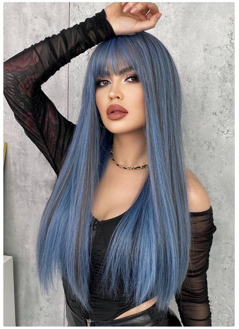 A wig with long straight synthetic hair highlighted in mermaid blue, featuring bangs, 61cm in length