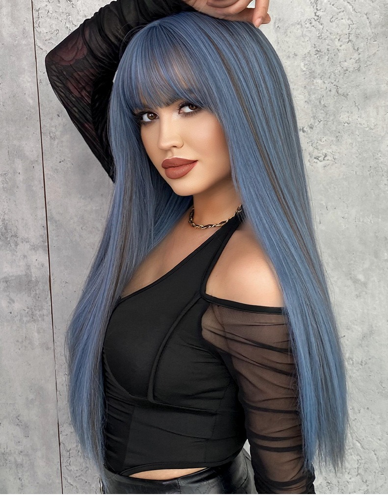 A wig with mermaid blue highlights, featuring 61cm long straight synthetic hair with bangs