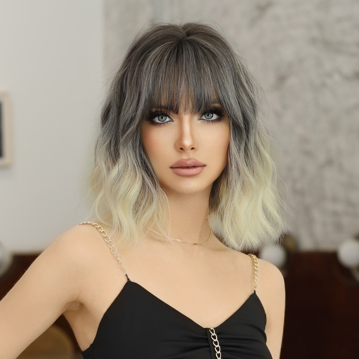 Synthetic wig by Yinraohai, showcasing women's short wavy hair in silver-white color, with dyed Japanese and Korean bangs, gradient effect, ready to go