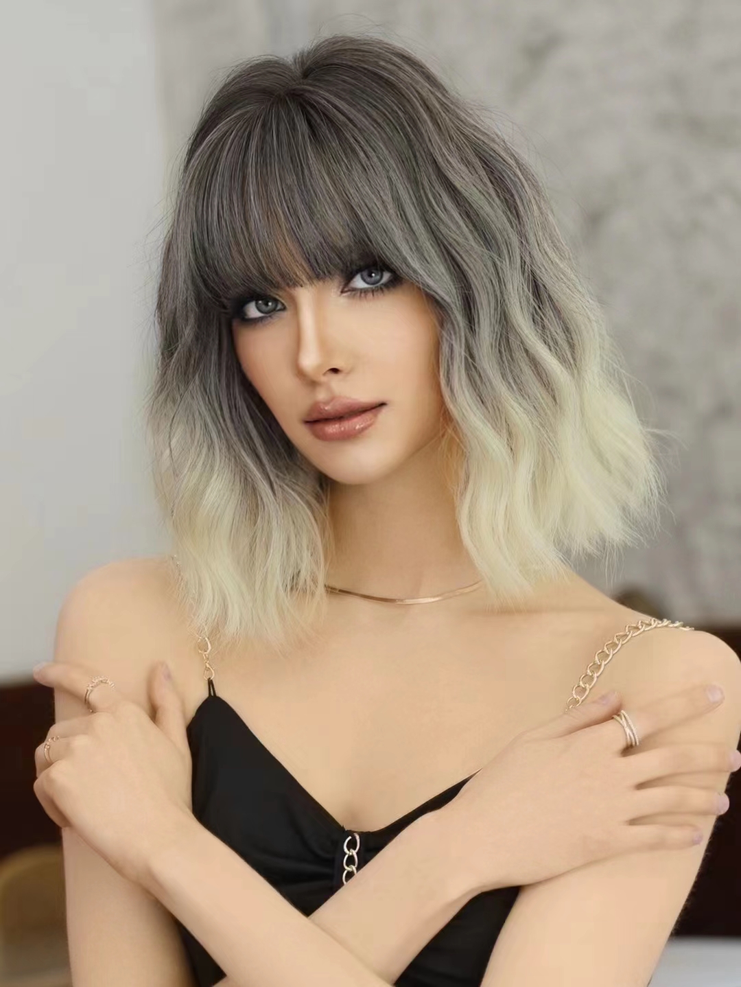Yinraohai synthetic wig for women, showcasing stylish short wavy silver-white hair with dyed Japanese and Korean bangs, gradient effect, ready to go