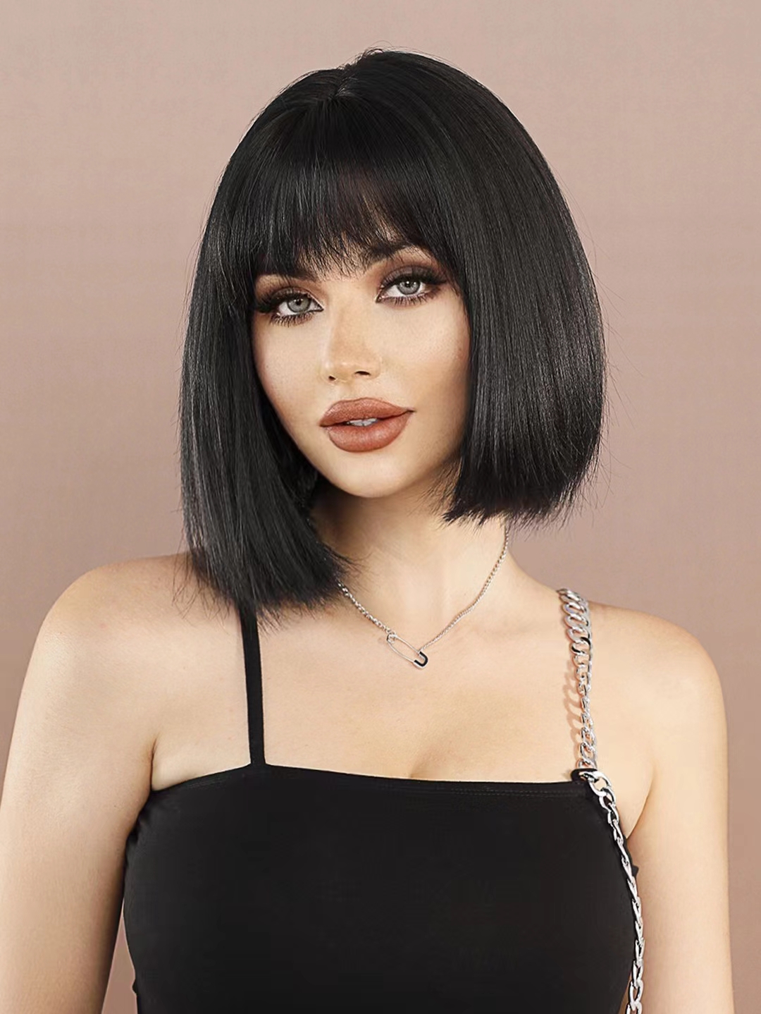 Ready-to-go synthetic wig in YAKI black bob style, featuring short straight hair with bangs
