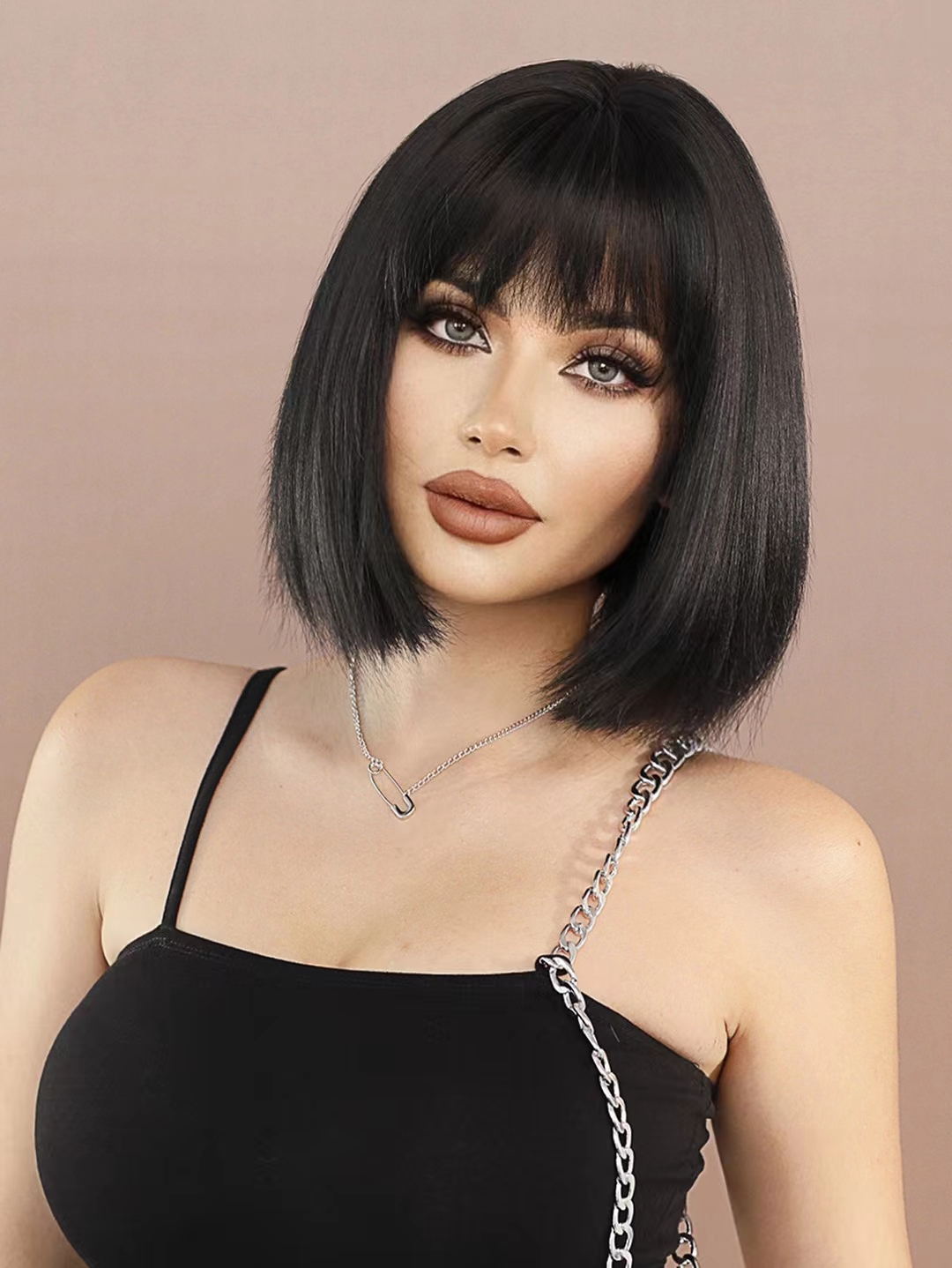 Fashionable synthetic wig in YAKI black bob style, with short straight hair and bangs, ready to go
