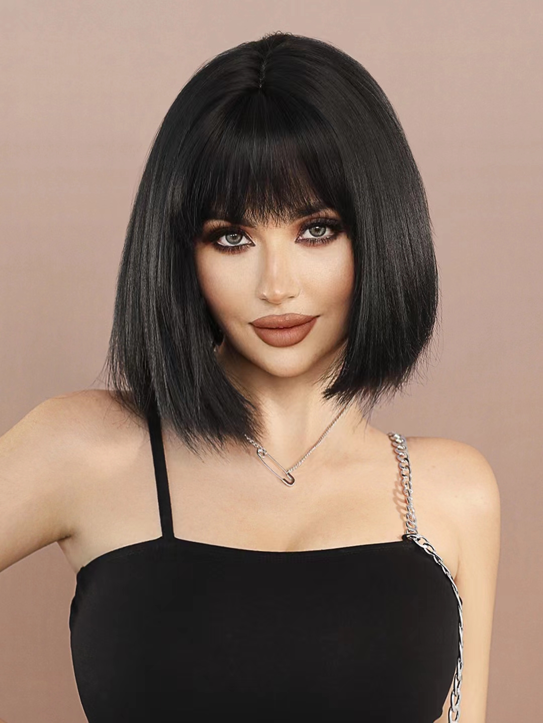 Short straight synthetic wig in YAKI black bob style, featuring bangs, ready to go