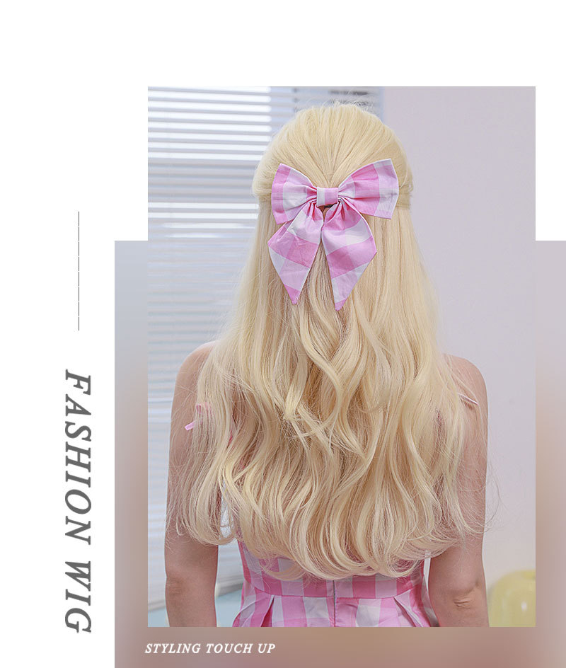 Synthetic wig by Yinraohair in Barbie blonde shade, featuring long curls with fringe, stylish full head set, ready to wear