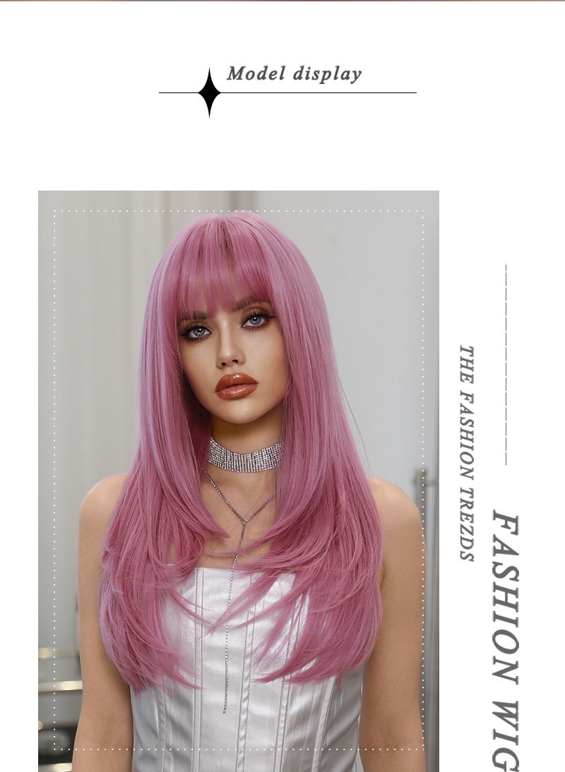 A synthetic wig ready to go, featuring long curly pink hair for a vibrant look.