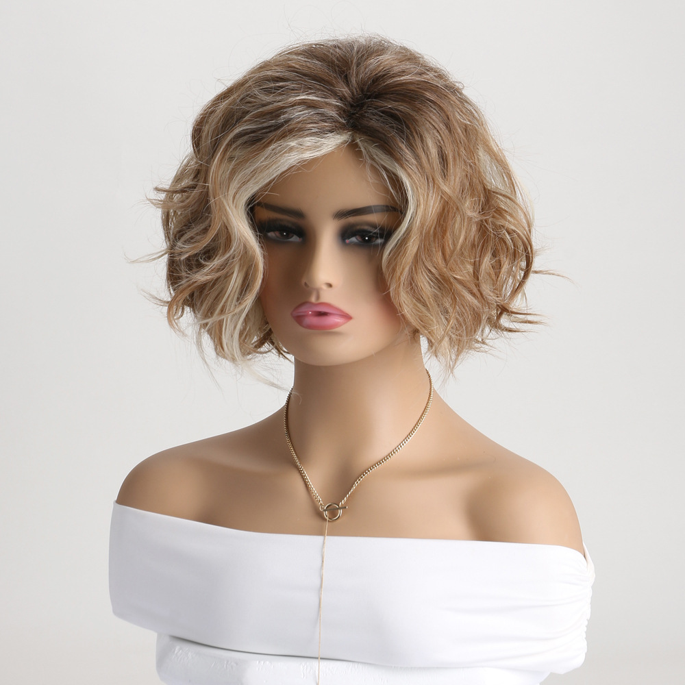 A fluffy short curly synthetic wig with a stylish blend of light blonde and brown tones, complemented by diagonal bangs