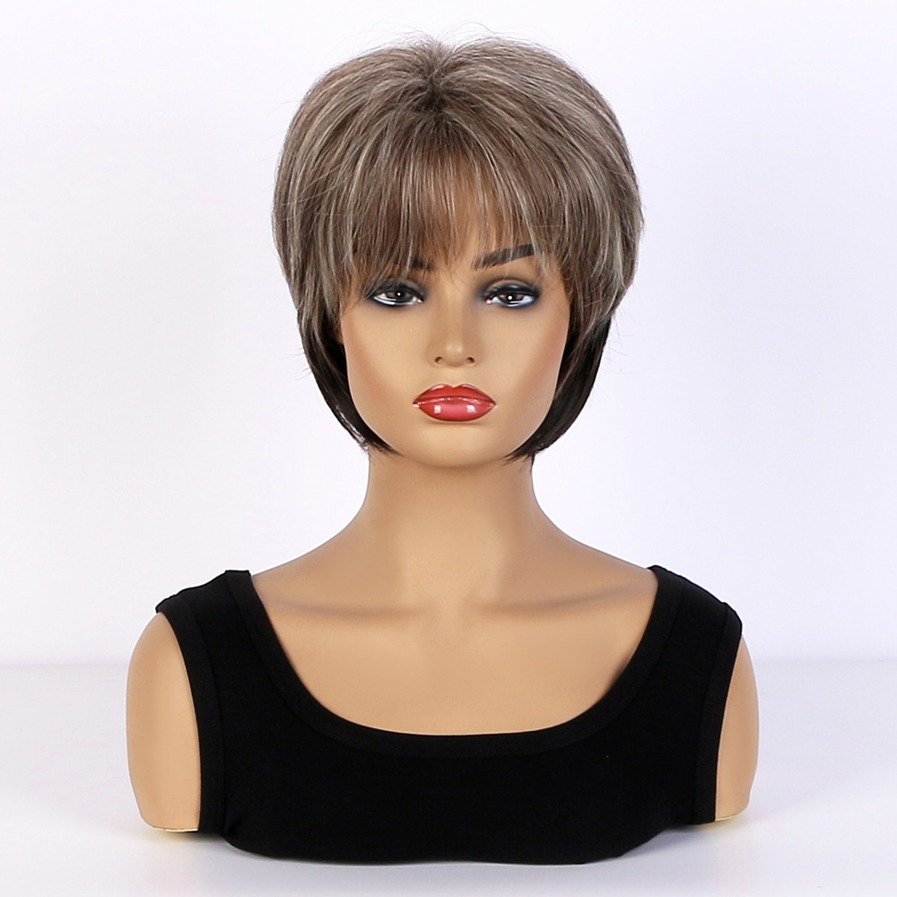 A synthetic wig with short straight hair and bangs, featuring a mixed color