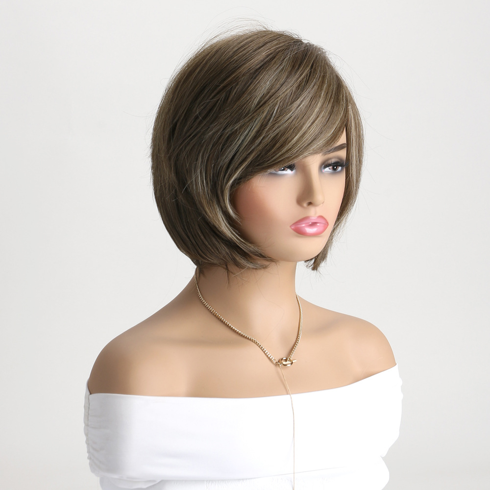 A stylish synthetic wig in light brown with short curly hair and diagonal bangs