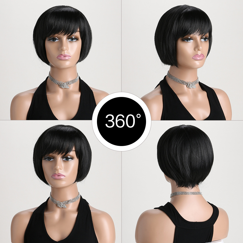 Synthetic wig with short straight hair in a black bob style with diagonal bangs