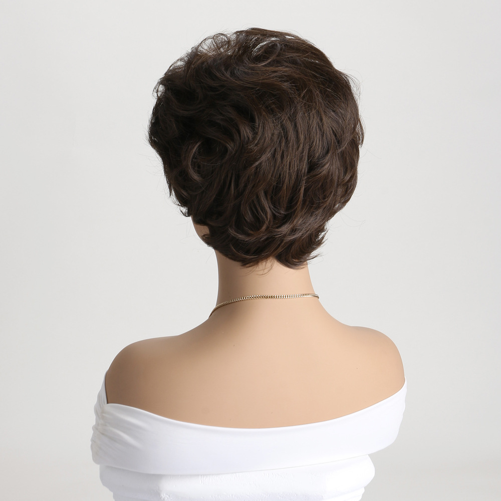 Chic brown synthetic wig with short curly hair, mid part, and small curly wig headgear, designed for a stylish look