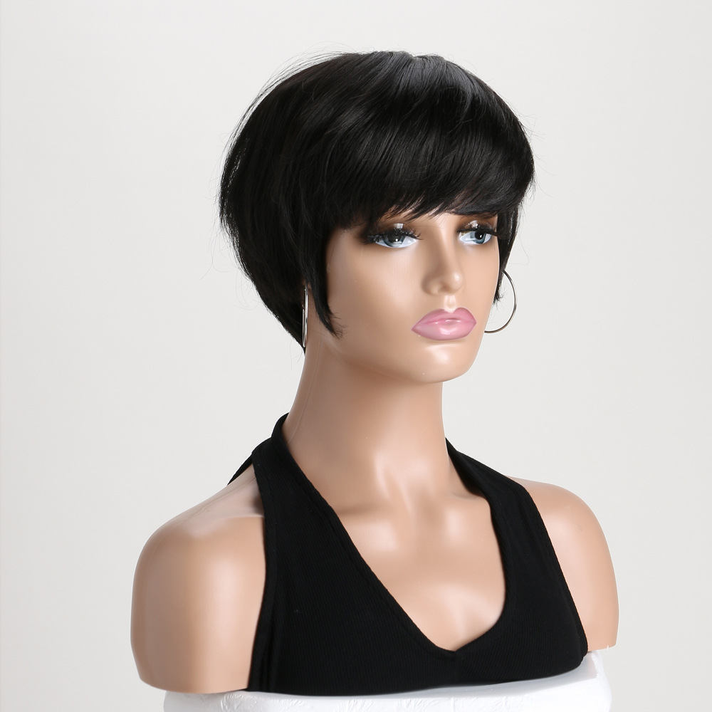 Chic black bob synthetic wig with headgear, featuring diagonal bangs and short straight hair
