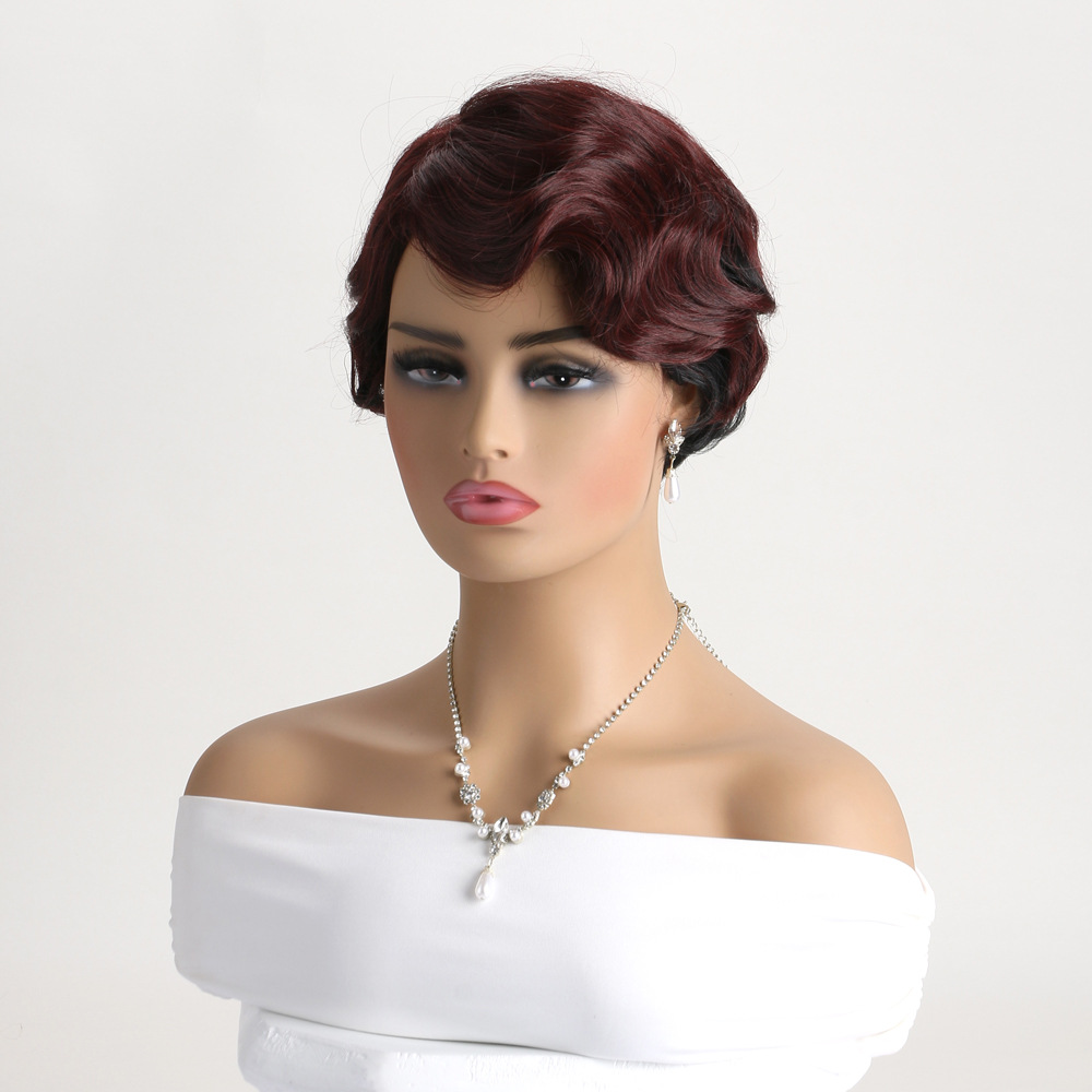 A synthetic wig styled in a retro fashion for women, featuring short curly hair with colorful highlights
