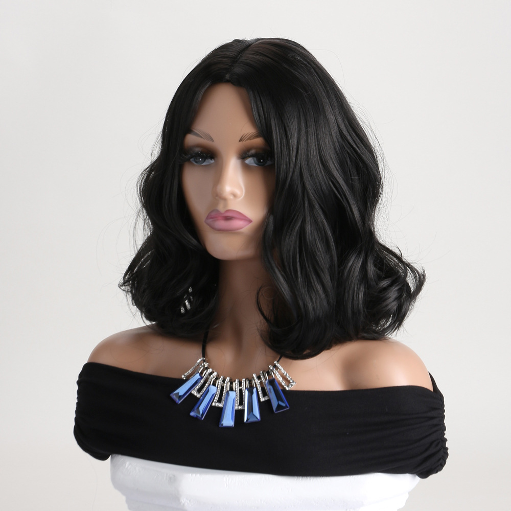 Small curly wig headgear included with black fashion synthetic wig featuring medium-length curly hair