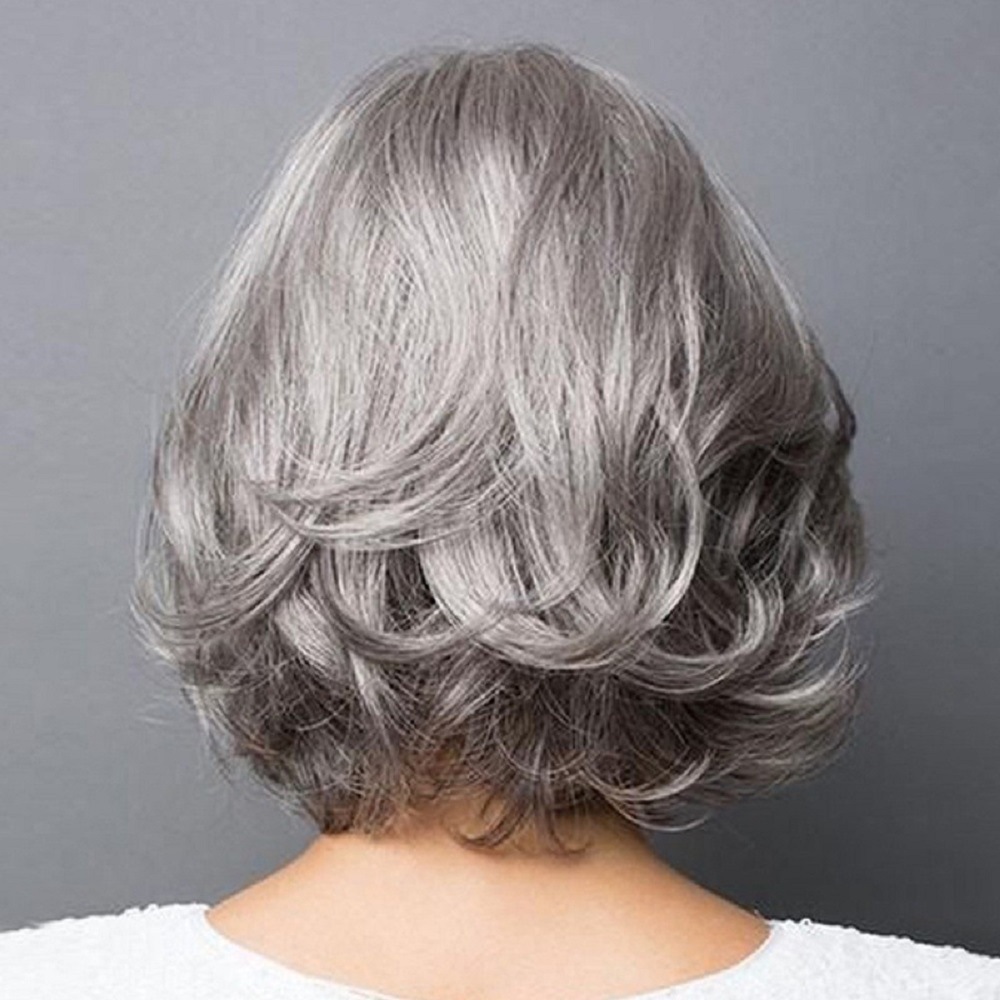 mage of a synthetic wig in silver with side parting curly short hair, perfect for women