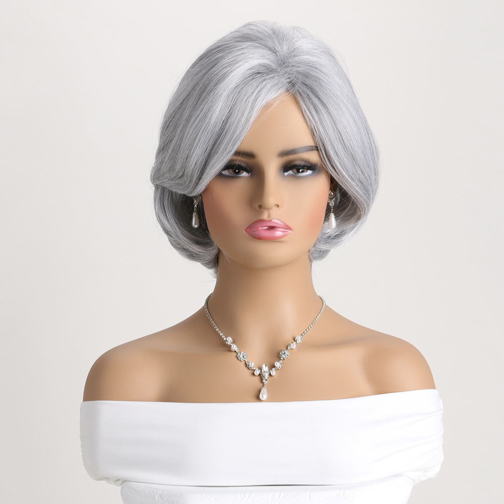 A fashionable synthetic wig for women featuring silver curly short hair with a side parting