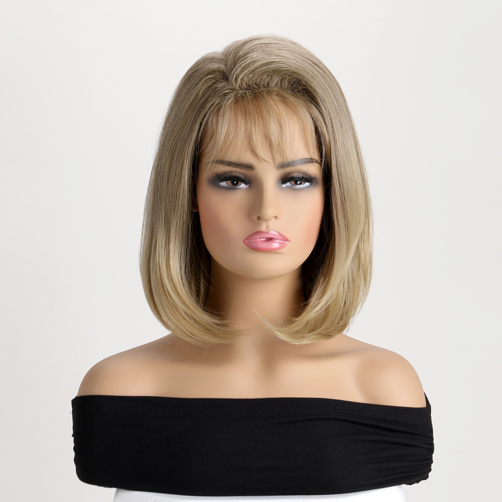 A light blonde short straight synthetic wig with bangs, designed for women