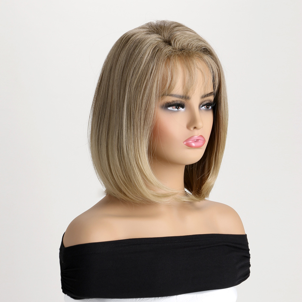 A synthetic wig in light blonde with short straight hair and bangs, perfect for women
