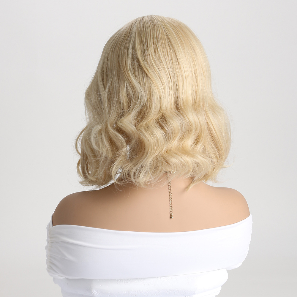A wig in light blonde, styled as a short curly synthetic wig, perfect for females seeking small curly styles